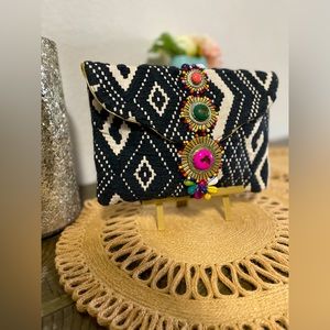 Aztec night clutch, great for a pop of color to your look!